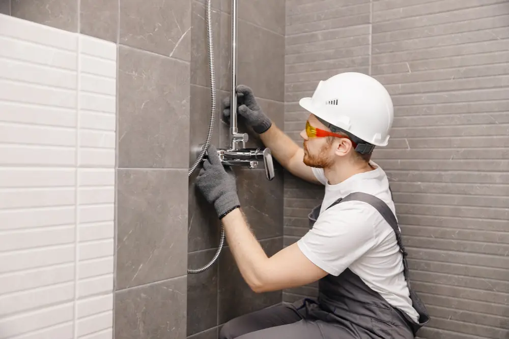 Licensed plumber providing plumbing maintenance in a Ramara Township residential home